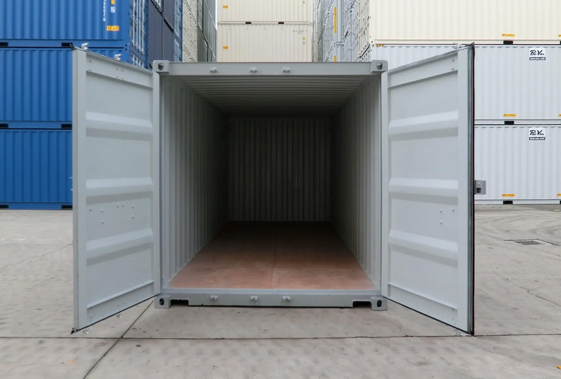 Interior of a one-trip 20ft shipping container with doors open