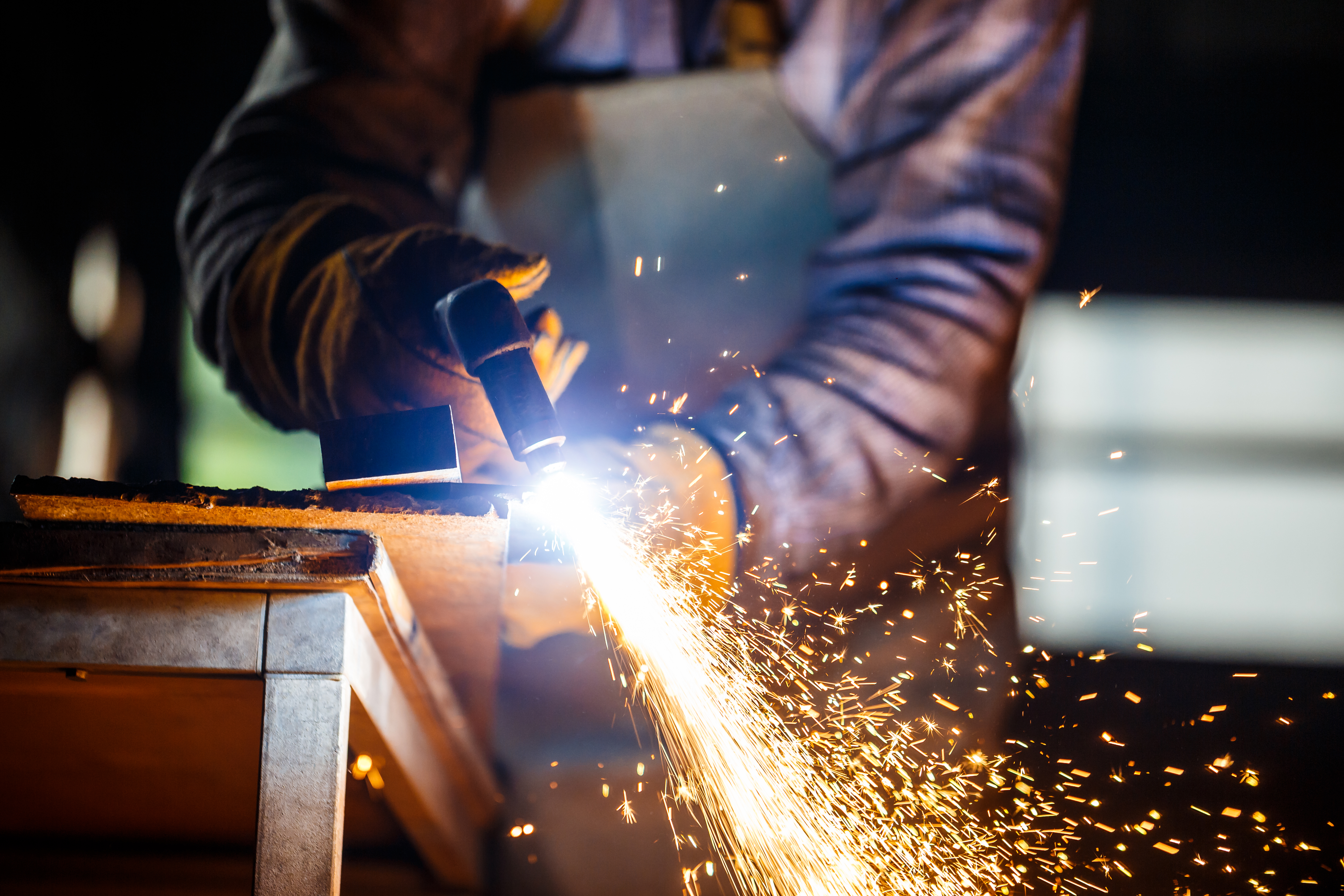 Metal fabrication work on a shipping container home conversion